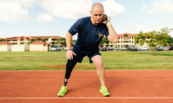 Image: Brett competes in shot put at the Wounded Warrior Pacific Invitational in Hawaii. / Photo Courtesy of the Department of Defense