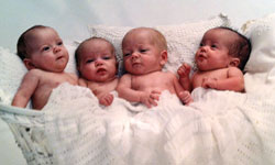 Image: This family portrait of the Regulacion quadruplets is still on display in the family