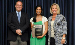 Image: Obstetrics and gynecology resident Prardhana Challapalli, MD, receives the Rosilie O. Saffos Outstanding Resident Teacher Award from Genuardi and Edwards.