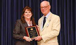 Image: Phyllis Hendry, MD, a tenured professor of emergency medicine and pediatrics at the UF College of Medicine – Jacksonville, won this year’s Robert C. Nuss Researcher/Scholar Award, which is given to a faculty member with a distinguished record of current research. UFCOMJ Dean Daniel R. Wilson, MD, PhD, stands beside her.