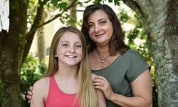 Image: Breast cancer survivor Renay Daigle, right, with her daughter Bailey.