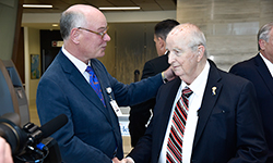 Image: Drewa speaks with Daniel R. Wilson, MD, PhD, during the Feb. 25 atrium naming ceremony. Wilson is dean of the University of Florida College of Medicine – Jacksonville.