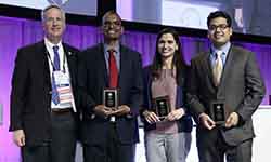 Image: Naila Choudhary, MD, and Amit Gupta, MD, cardiovascular disease fellows at the UF College of Medicine – Jacksonville, finished second in a national Jeopardy-style competition sponsored by the American College of Cardiology. Choudhary is pictured third from the left and Gupta is on the far right. Photo credit: Lagniappe Studio 