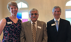 Image: From left, Karen Mayfield, Mobeen Rathore, MD, and Chuck Hedrick gather for a photo during Rathore’s installation as president of Leadership Jacksonville. Mayfield is the organization’s outgoing president and Hedrick is the immediate past president.