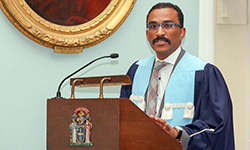Image: Fernandes addresses new fellows during the induction ceremony in Edinburgh, Scotland.