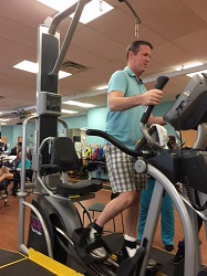 Image: Robert Ayer strengthening his leg muscles at Brooks Rehabilitation.