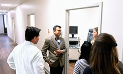 Image: Staff treated senior leadership and guests to a tour of the renovated space, which features interview and examination rooms for those who participate in clinical trials.