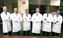 Image: The UF Health Comprehensive Spine Center’s team of board-certified, fellowship-trained neurosurgeons includes, from left, Grzegorz Brzezicki, MD, PhD; Kourosh Tavanaiepour, DO; Carlos Arce, MD; Daryoush Tavanaiepour, MD; Dunbar Alcindor, MD; and Gazanfar Rahmathulla, MD.