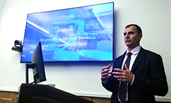 Image: Daryoush Tavanaiepour, MD, an assistant professor and interim chair of neurosurgery at the UF College of Medicine – Jacksonville, presents during the May 23 grand opening celebration of the center.