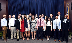 Image: Emergency medicine resident physicians, along with program and UF COMJ leaders, gather for a photo during Celebration of Education.