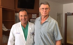 Image: Dr. Soffer standing next to John Lukas the morning after his procedure.