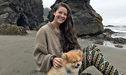 Image: Ashley Durand enjoys the Oregon coast with her furry friend.