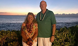 Image: Maureen and her husband, Richard enjoying a sunset on a recent trip to Hawaii.