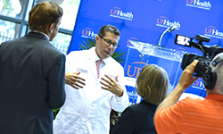 Image: UF Health President David R. Nelson, MD, greets faculty and staff during a reception in his honor on the UF Health Jacksonville campus.