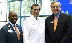 Image: Pictured from left are UF Health Jacksonville CEO Leon L. Haley Jr., MD, MHSA; UF Health President David R. Nelson, MD; and University of Florida President Kent Fuchs.