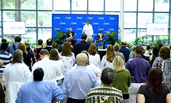 Image: The crowd looks on as David R. Nelson, MD, delivers remarks, which touched on ways to collaborate and position the UF Health Jacksonville campus for continued success.