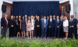 Image: Graduating internal medicine residents gather for a group photo during the ceremony.