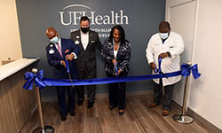 Image: From left to right: UF Health Jacksonville CEO Dr. Leon L. Haley, Jr., Florida senator Aaron Bean, vice president of community engagement and chief diversity officer Ann-Marie Knight, and medical director of the UF Health Total Care Clinic – Jacksonville Dr. Ross Jones cut the ribbon on the Social Services Hub.