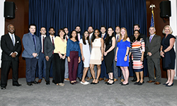 Image: Graduates of the internal medicine residency program gather for a group photo during Celebration of Resident and Fellow Education and Research Day.