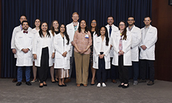 Image: Graduates of the pediatric residency program gather for a photo at the annual ceremony.