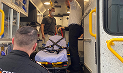 Image: David had an emotional tour of the TraumaOne Critical Care Transport Ambulance that transferred him from the Gate River Run to UF Health Jacksonville.