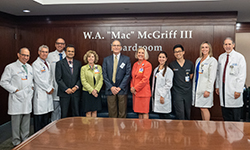 Image: Distinguished Alumni Award recipient, Richard Milani, MD, FACC, FAHA, stands with UF College of Medicine – Jacksonville leadership and faculty.