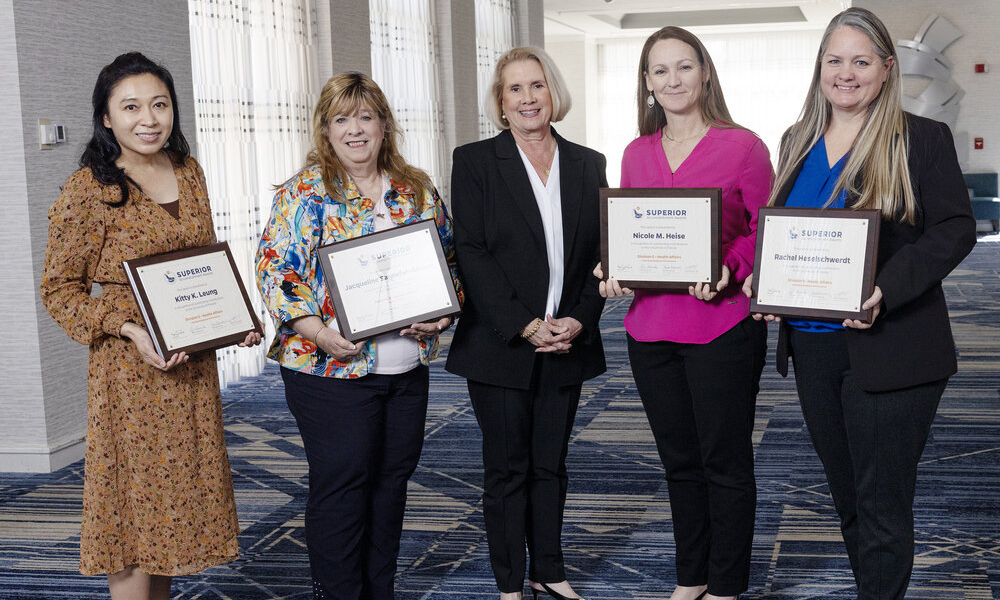 Image: Dr. Linda Edwards, dean of the UF College of Medicine – Jacksonville, stands with 2024 Superior Accomplishment Awards recipients.